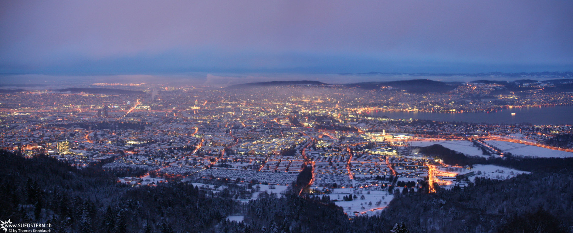 Panorama of Zuerich at the beginning of a winters night
